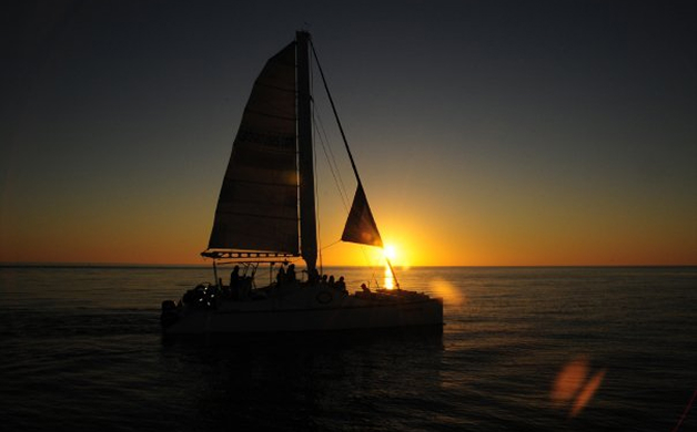 Sunset sailing aboard the Adventure catamaran
